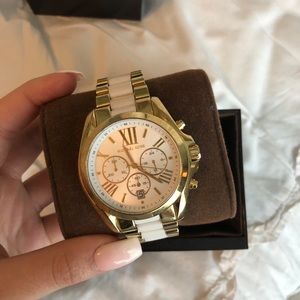 Gold and white Michael Kors watch